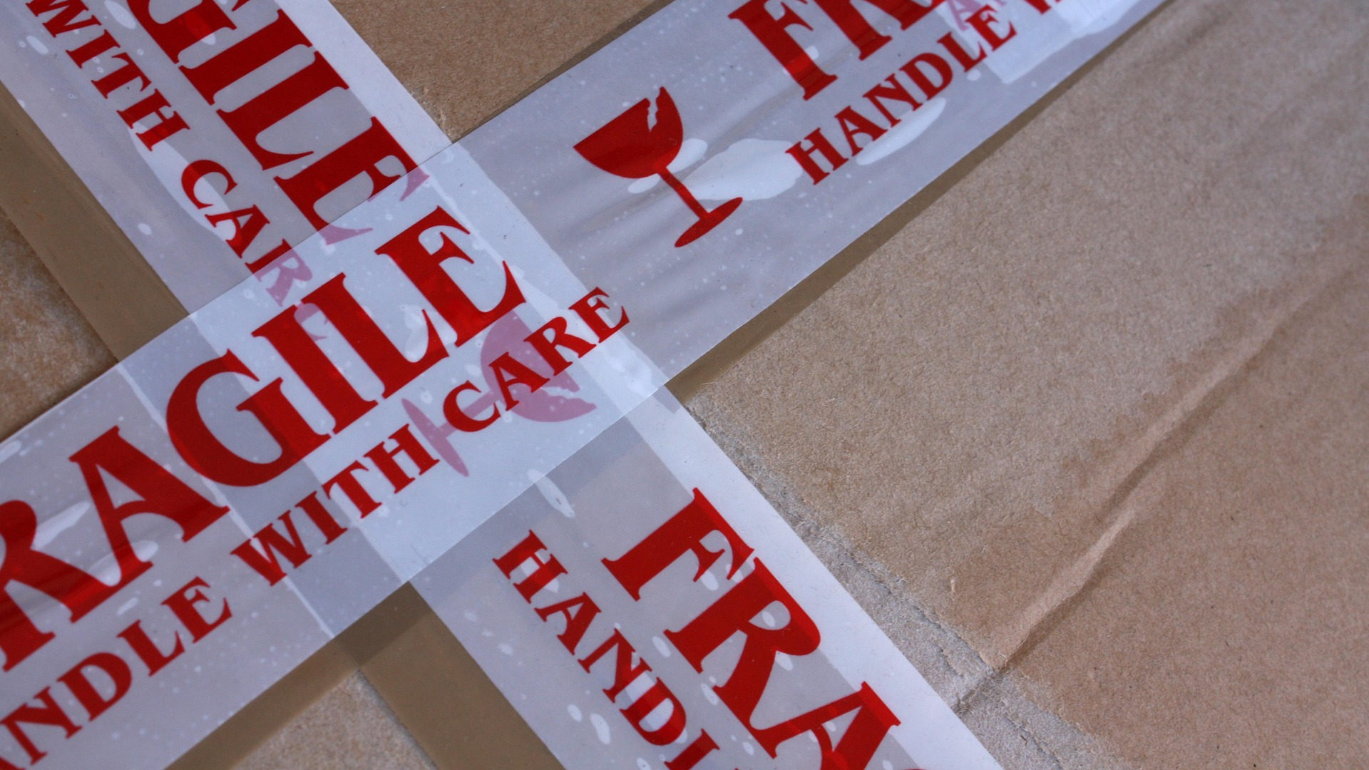 A box with fragile tape on it
