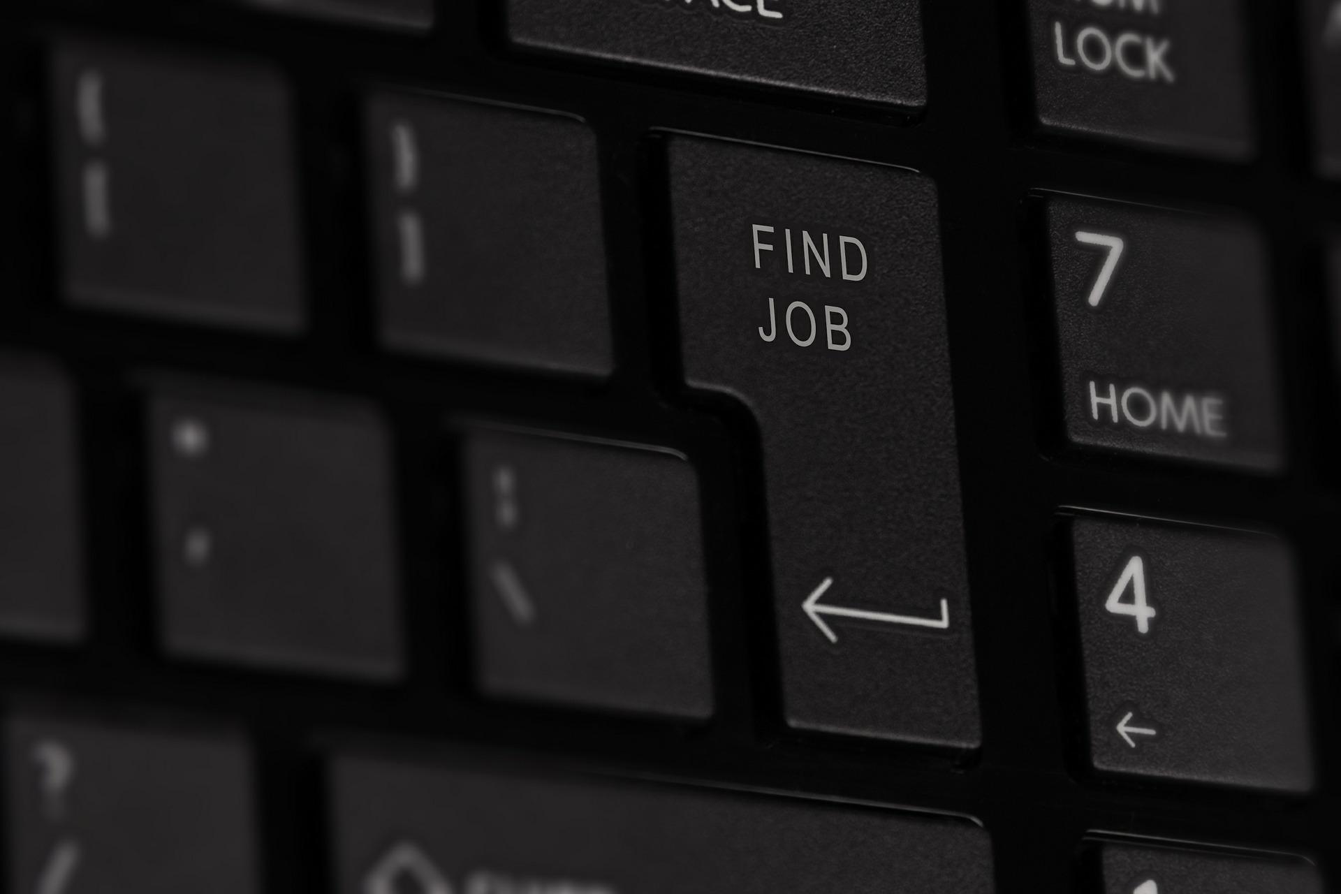 a keyboard with a "find job" key