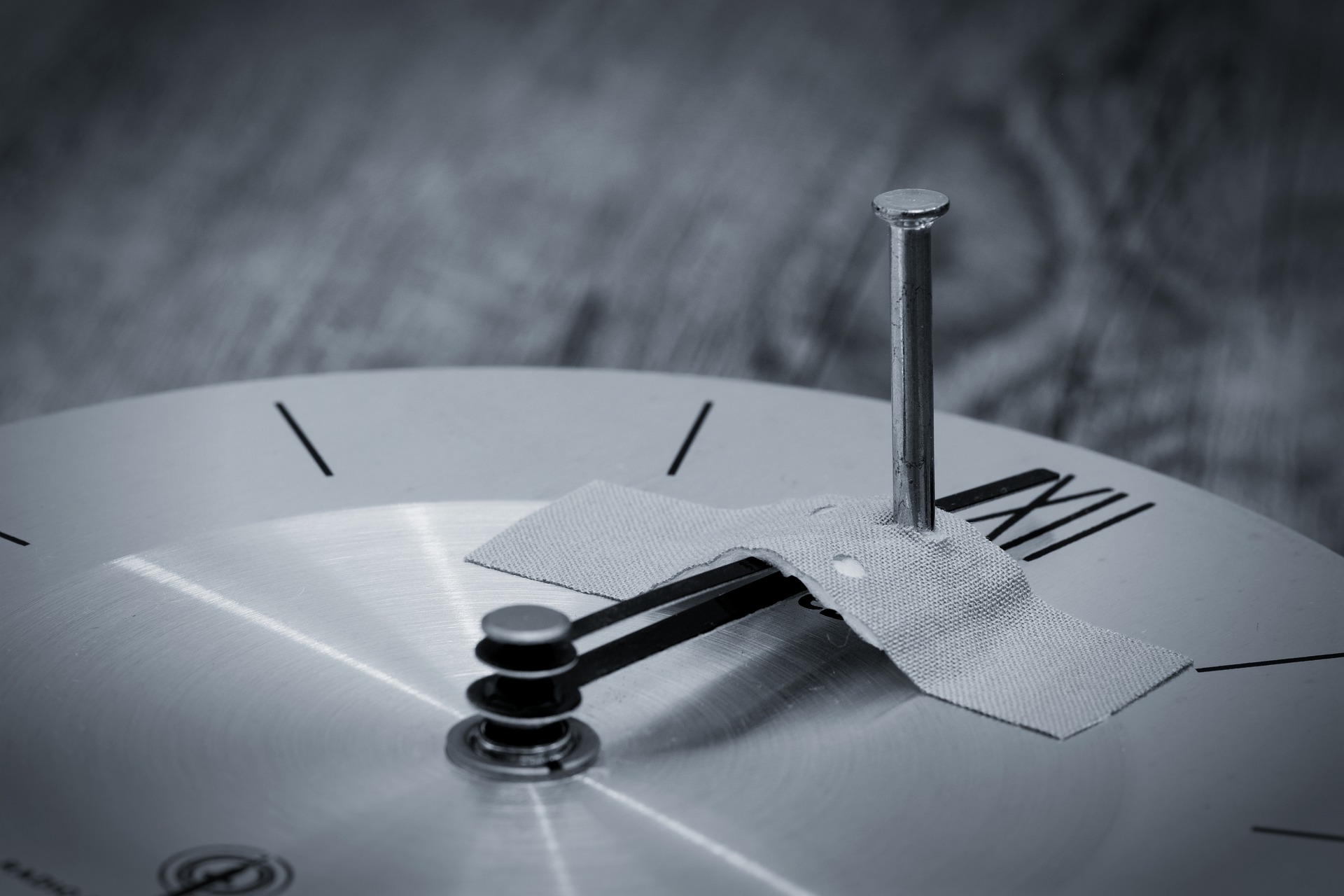 a clock with the hands nailed down